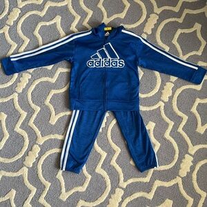 Brand new boys Adidas jogging outfit with a hooded jacket.